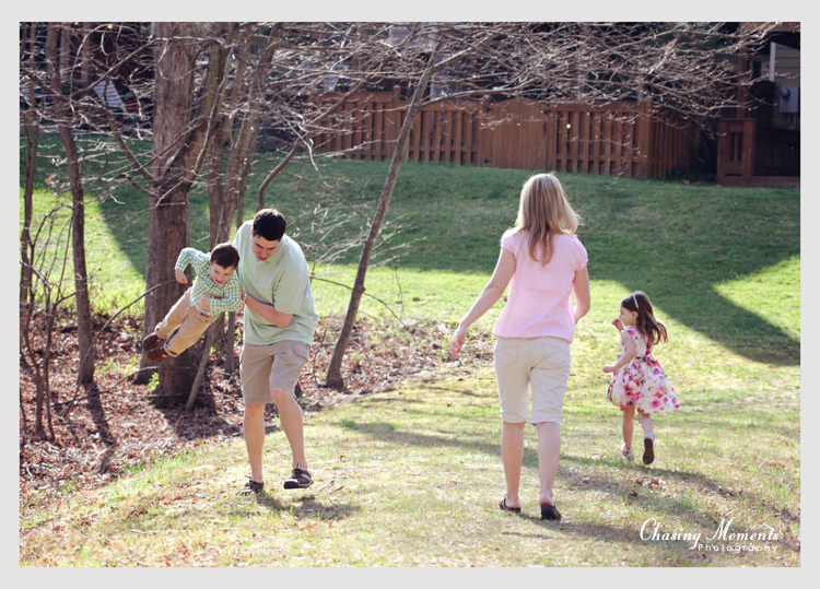 Family Running and having fun during an outdoor photography portrait session in Northern Virginia
