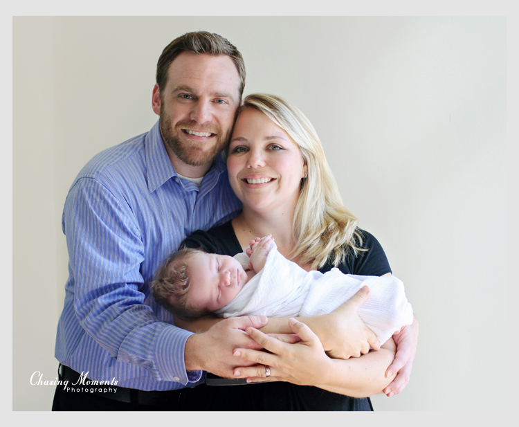 family portrait, mom, dad and newborn baby boy