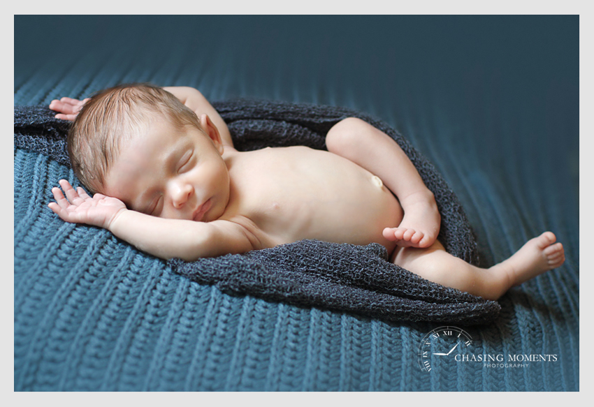newborn baby boy asleep on blue blanket, arlington va